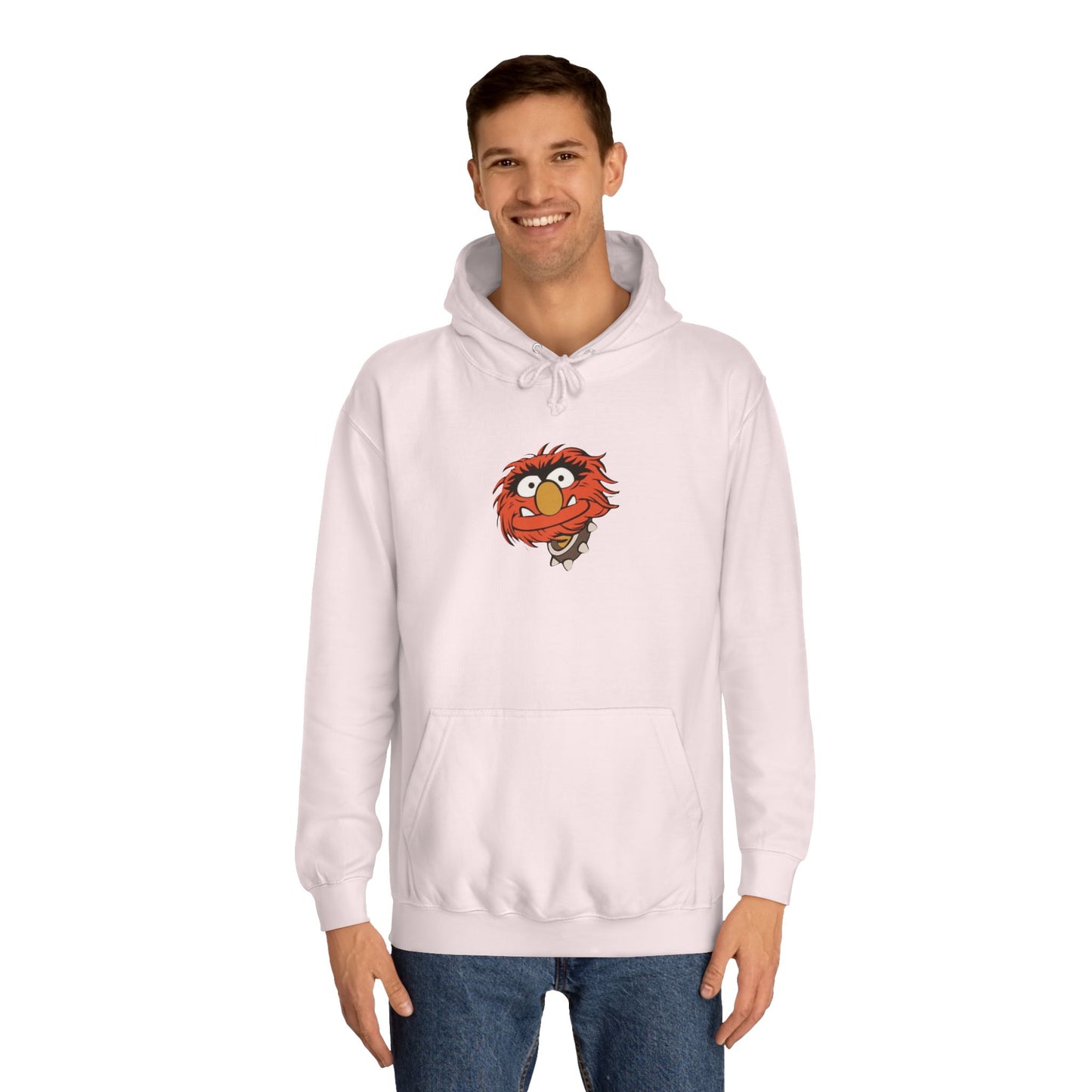 This comfy unisex college hoodie by Printify showcases a vibrant design of a cartoon character with wild orange hair, bulging eyes, and a broad grin on the front, embodying that lively spirit. It's like wearing the Animal - The Muppets hoodie without sacrificing comfort.