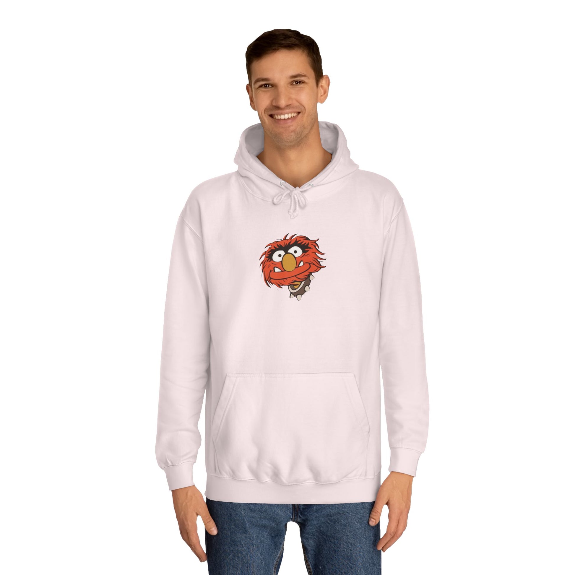 This comfy unisex college hoodie by Printify showcases a vibrant design of a cartoon character with wild orange hair, bulging eyes, and a broad grin on the front, embodying that lively spirit. It's like wearing the Animal - The Muppets hoodie without sacrificing comfort.