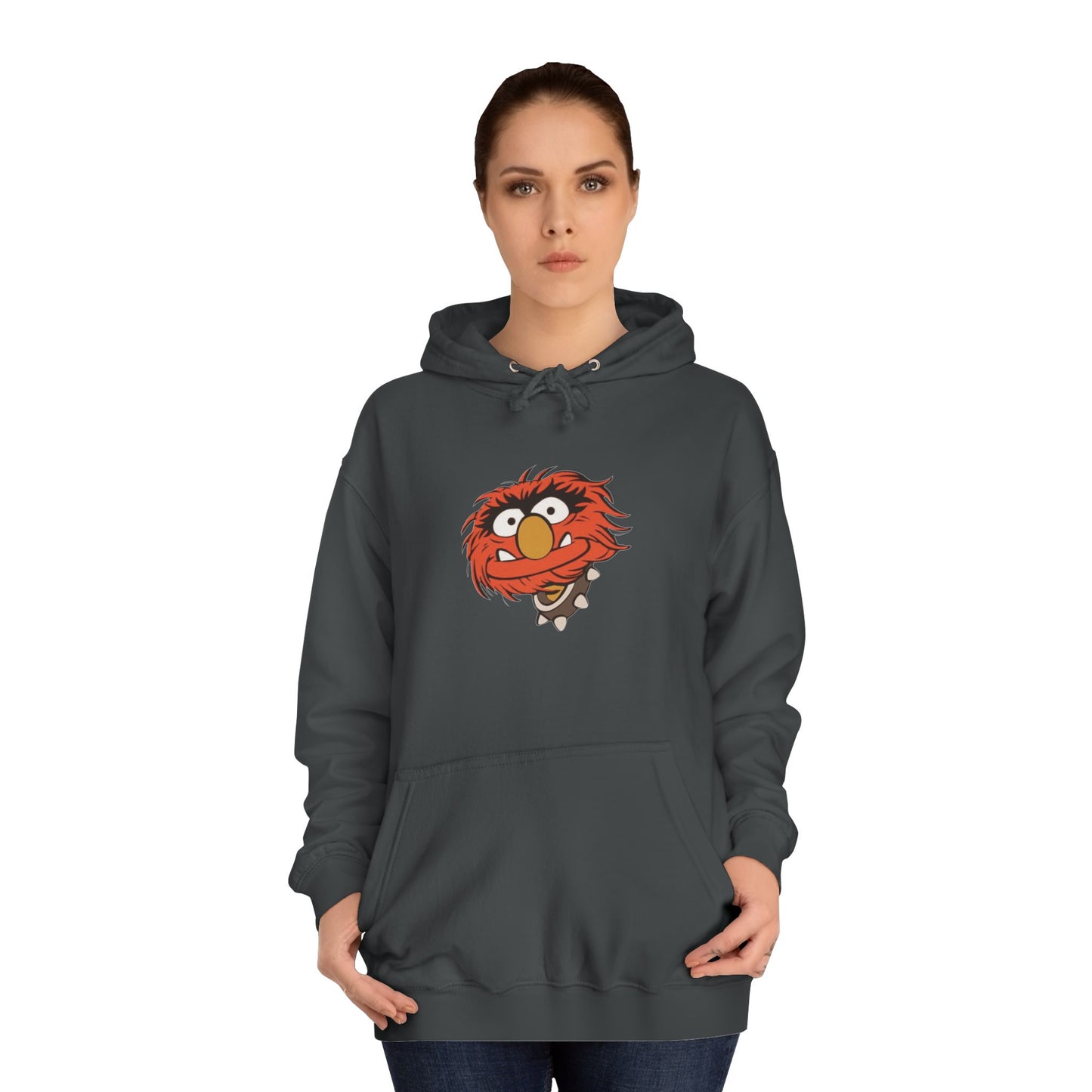 This comfy unisex college hoodie by Printify showcases a vibrant design of a cartoon character with wild orange hair, bulging eyes, and a broad grin on the front, embodying that lively spirit. It's like wearing the Animal - The Muppets hoodie without sacrificing comfort.