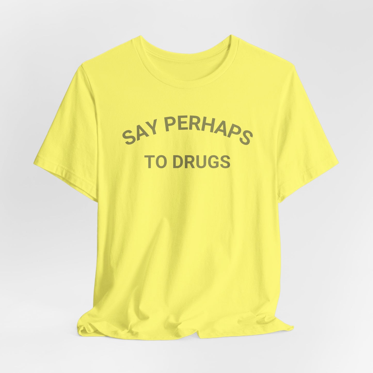 A Printify "Say Perhaps to Drugs" unisex jersey short sleeve tee in blue, featuring the text "SAY PERHAPS TO DRUGS" in dark letters across the front. The soft cotton shirt is displayed against a plain white background.