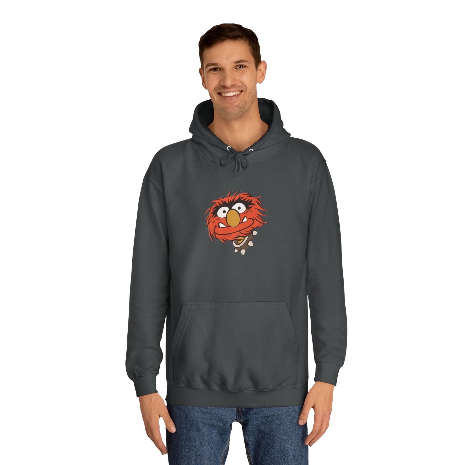 This comfy unisex college hoodie by Printify showcases a vibrant design of a cartoon character with wild orange hair, bulging eyes, and a broad grin on the front, embodying that lively spirit. It's like wearing the Animal - The Muppets hoodie without sacrificing comfort.