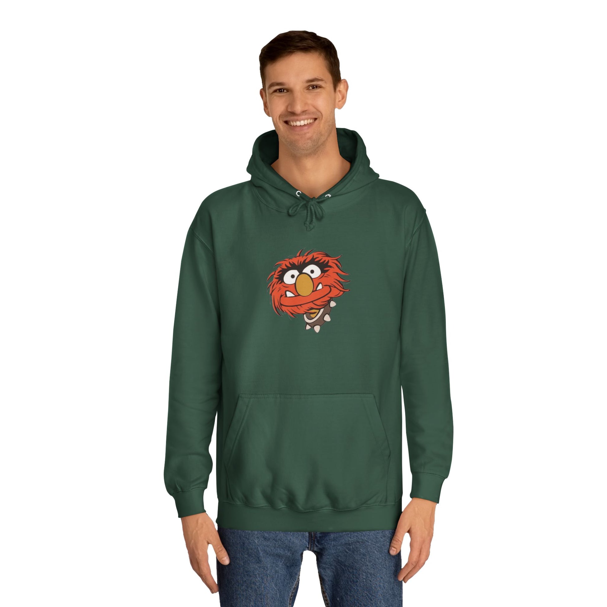 This comfy unisex college hoodie by Printify showcases a vibrant design of a cartoon character with wild orange hair, bulging eyes, and a broad grin on the front, embodying that lively spirit. It's like wearing the Animal - The Muppets hoodie without sacrificing comfort.