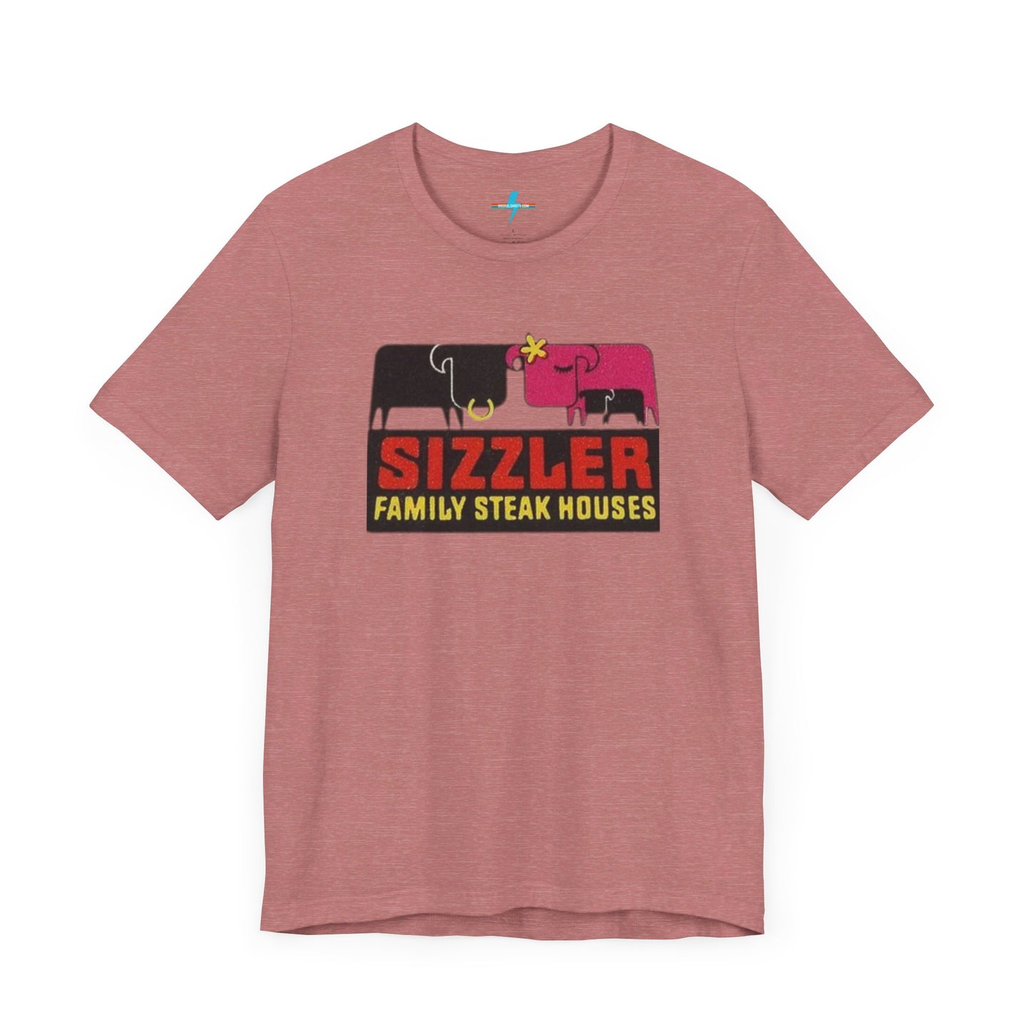 The "Sizzler Family Steakhouses - Retro 1981 Logo - Unisex Jersey Short Sleeve Tee" by Printify is a gray t-shirt showcasing a retro-style graphic with two black and pink cows, a cactus, and the text "Sizzler Family Steak Houses" in vibrant red and yellow. Ideal for any retro enthusiast, this design evokes nostalgia reminiscent of vintage restaurant logos from 1981.