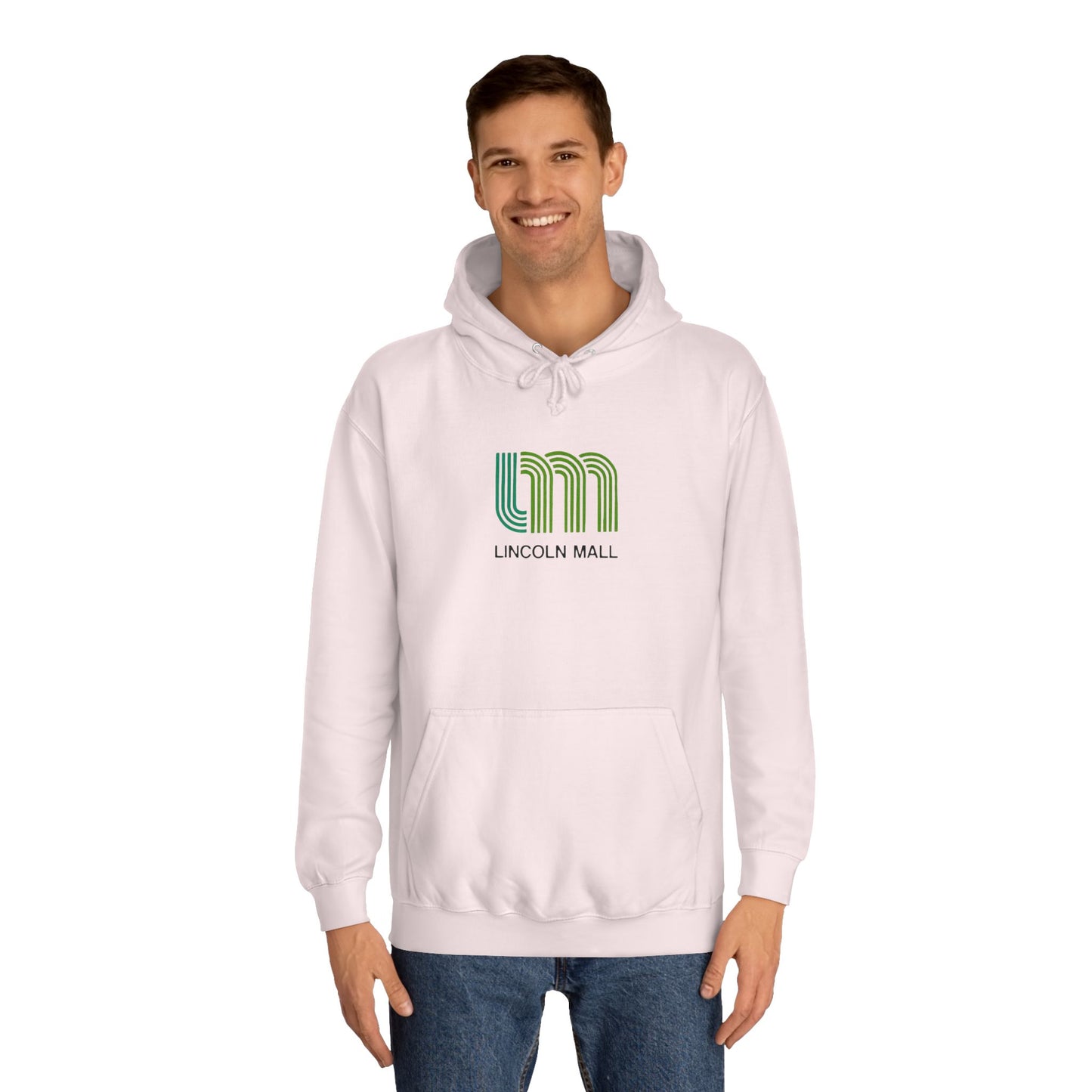 This unisex college hoodie by Printify features a gray design with a stylized green "LM" logo above the text "Lincoln Mall," inspired by the 1980s. It comes complete with a front pocket and drawstrings, capturing the retro style of Lincoln Mall, Matteson, IL.