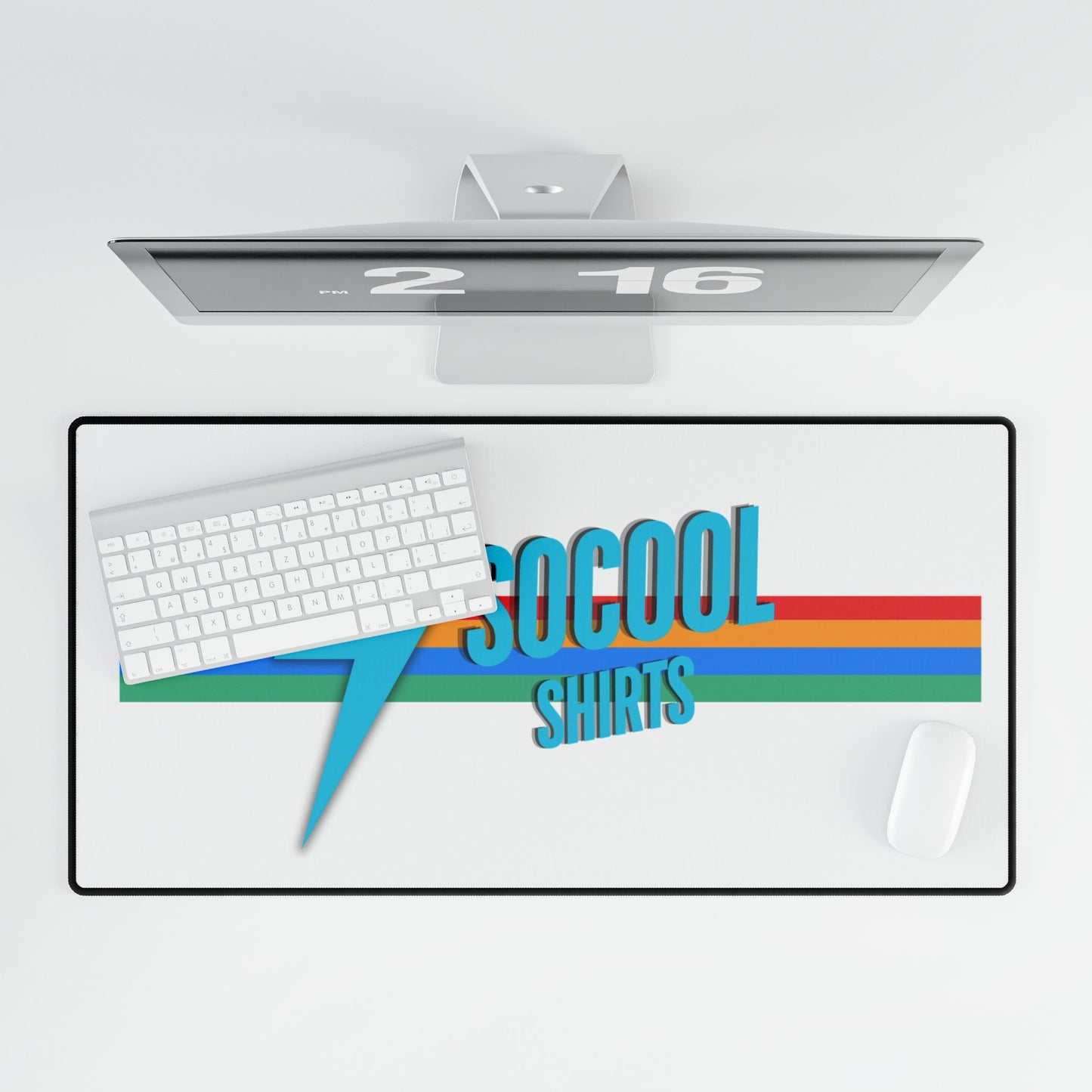 A logo for "SoCool Shirts" features a blue lightning bolt to the left of the brand name, which is written in blue letters against a horizontally striped background consisting of red, yellow, green, and blue colors. The logo sits on a white backdrop with a black border. This design is perfect for customizing desk mats from Printify's SoCool Shirts collection, offering a non-slip base and anti-fray edges.
