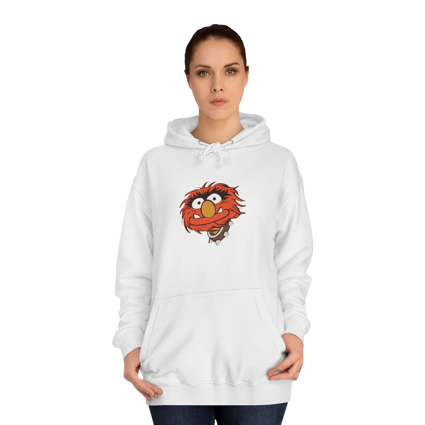 This comfy unisex college hoodie by Printify showcases a vibrant design of a cartoon character with wild orange hair, bulging eyes, and a broad grin on the front, embodying that lively spirit. It's like wearing the Animal - The Muppets hoodie without sacrificing comfort.