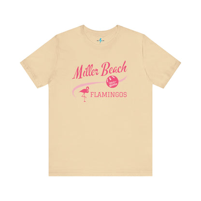 Printify offers the Miller Beach Flamingos WWBC - Unisex Jersey Short Sleeve Tee, featuring a light pink T-Shirt adorned with "Miller Beach Flamingos" and a volleyball graphic in pink. This design also includes an illustration of a flamingo, celebrating their participation in the World Wiffel Ball Championship. The shirt is showcased against a minimalist, white backdrop.