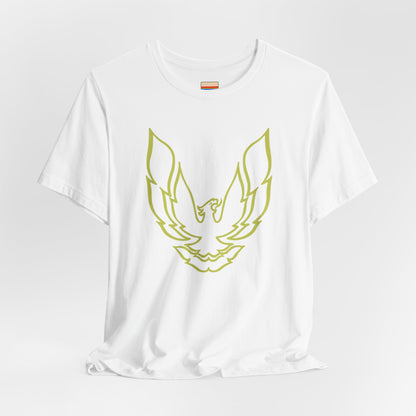 The Pontiac Trans Am Phoenix Shirt - Unisex Jersey Short Sleeve Tee by Printify is a classic black T-shirt that showcases a stylized yellow phoenix design on the front, reminiscent of the iconic Pontiac Trans Am. The shirt is displayed laid flat against a white background.