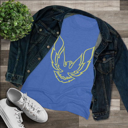 A retro 1970's-inspired red women's triblend tee by Printify, featuring a stylish gold phoenix design on the front. The vibrant, sleek graphic depicts the iconic Trans Am bird with its wings spread upward, giving this cozy t-shirt a bold and dynamic look.