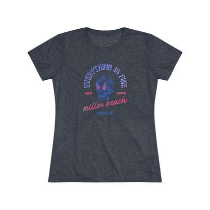 Introducing the Miller Beach - Everything is Fine - Calm Down Women's Triblend Tee by Printify – a dark gray, relaxed-fit shirt adorned with a neon blue and pink flaming skull at its center. Above the skull, the text reads "Everything is Fine" and "Calm Down," while below it says "Miller Beach, Gary, IN" in a stylish script font. This tee captures a cool vintage aesthetic perfect for casual wear.