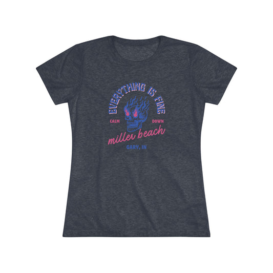 Introducing the Miller Beach - Everything is Fine - Calm Down Women's Triblend Tee by Printify – a dark gray, relaxed-fit shirt adorned with a neon blue and pink flaming skull at its center. Above the skull, the text reads "Everything is Fine" and "Calm Down," while below it says "Miller Beach, Gary, IN" in a stylish script font. This tee captures a cool vintage aesthetic perfect for casual wear.