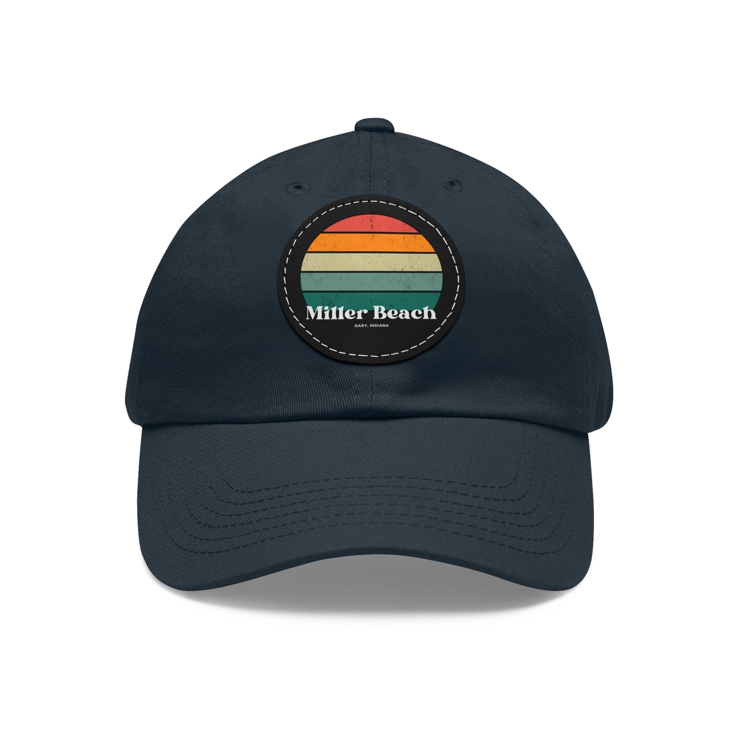 The Miller Beach Retro Sunset - Dad Hat with Leather Patch (Round) by Printify is a pink baseball cap crafted from bio-washed chino twill for added comfort. It features a PU leather patch adorned with horizontal stripes in red, orange, yellow, green, and blue. Below the stripes, "Miller Beach" is embroidered in white. An adjustable strap at the back ensures a perfect fit.