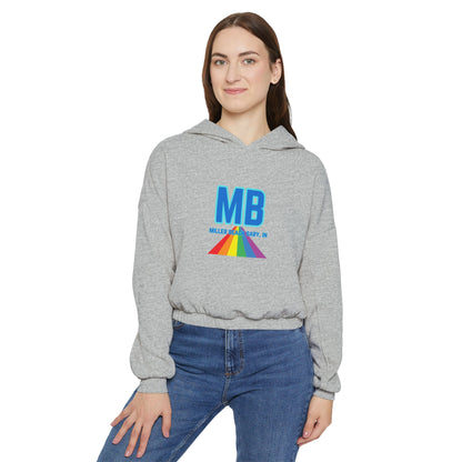 The Women's Cinched Bottom Hoodie from Printify, named "Miller Beach - Unity," is crafted in an oversized light gray design. It features a striking rainbow logo and bold blue "MB" letters on the front, with "MILLER & BARRY, INC." printed below. The casual style of this cotton-polyester blend is further accentuated by a lively triangular pattern.