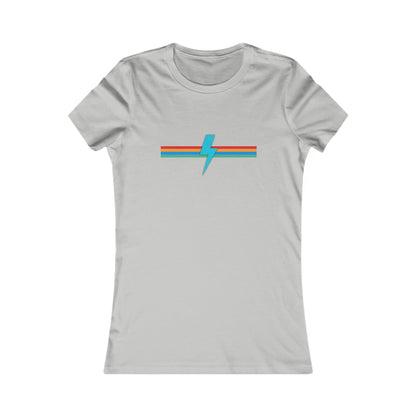 A light pink women's fitted t-shirt from Printify, called the SoCool Shirts OG Logo Retro - Women's Favorite Tee, showcases a minimalist design featuring a blue lightning bolt logo slicing through a horizontal tricolor stripe in red, orange, and teal across the chest area. The shirt boasts short sleeves, a round neckline, and is made from soft Bella + Canvas fabric.