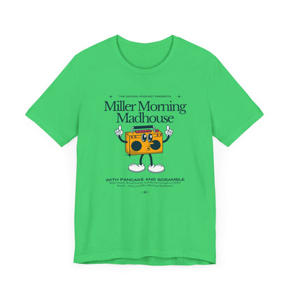 This Printify unisex jersey short sleeve tee in Sand Dune features a playful boombox cartoon character with arms, legs, and sunglasses. Emblazoned with "Miller Morning Madhouse," it highlights podcast details from "The School Podcast Presents.