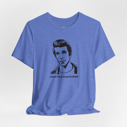 A white unisex jersey short sleeve tee by Printify, named "Caught in a Fonzi Scheme - Happy Days - Retro," features a black and white illustration of a person with a serious expression and styled hair, perfectly capturing the nostalgic apparel vibe. Below the illustration, the text reads "CAUGHT IN A FONZI SCHEME," making it an ideal Happy Days tribute shirt.