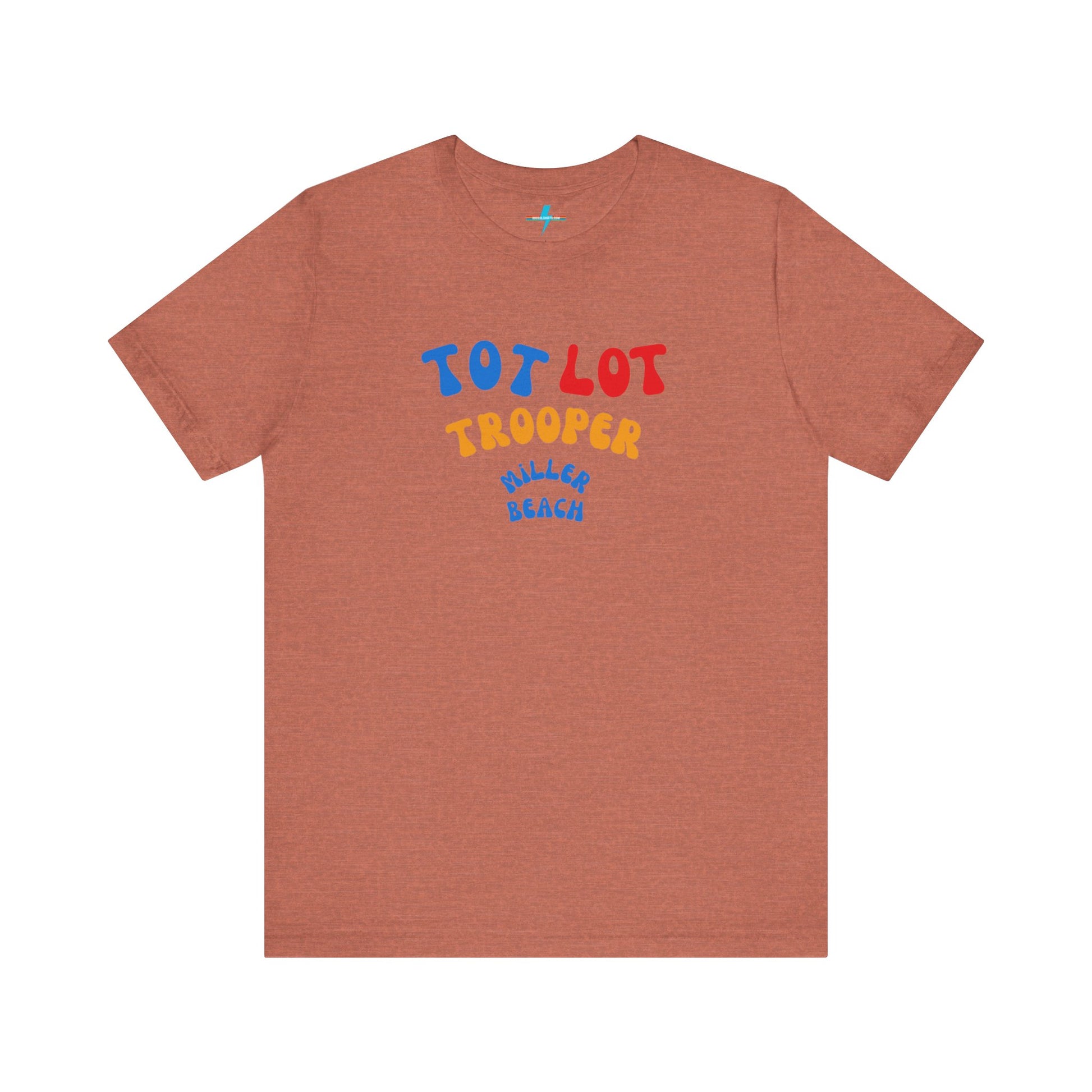 A green unisex jersey short sleeve tee from Printify, featuring colorful text on the front that reads "TOT LOT TROOPER MILLER BEACH" in blue, red, yellow, and orange letters. The shirt is displayed against a plain white background.