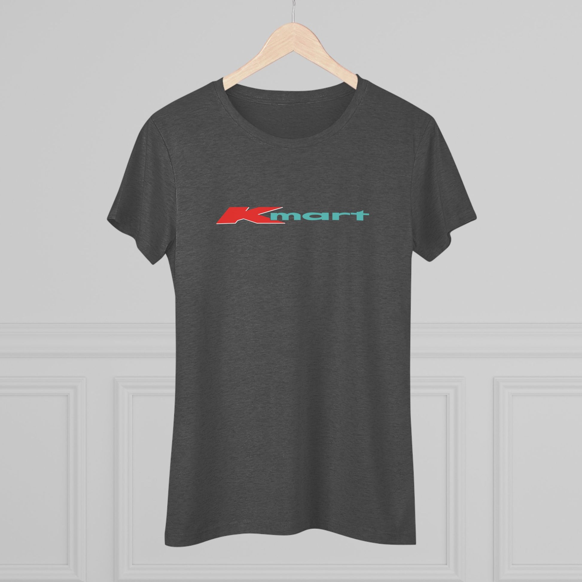 A women's triblend tee by Printify in light gray, featuring a casual and minimalist design that captures the essence of vintage style with a centered 1980s Retro Kmart logo on the front.