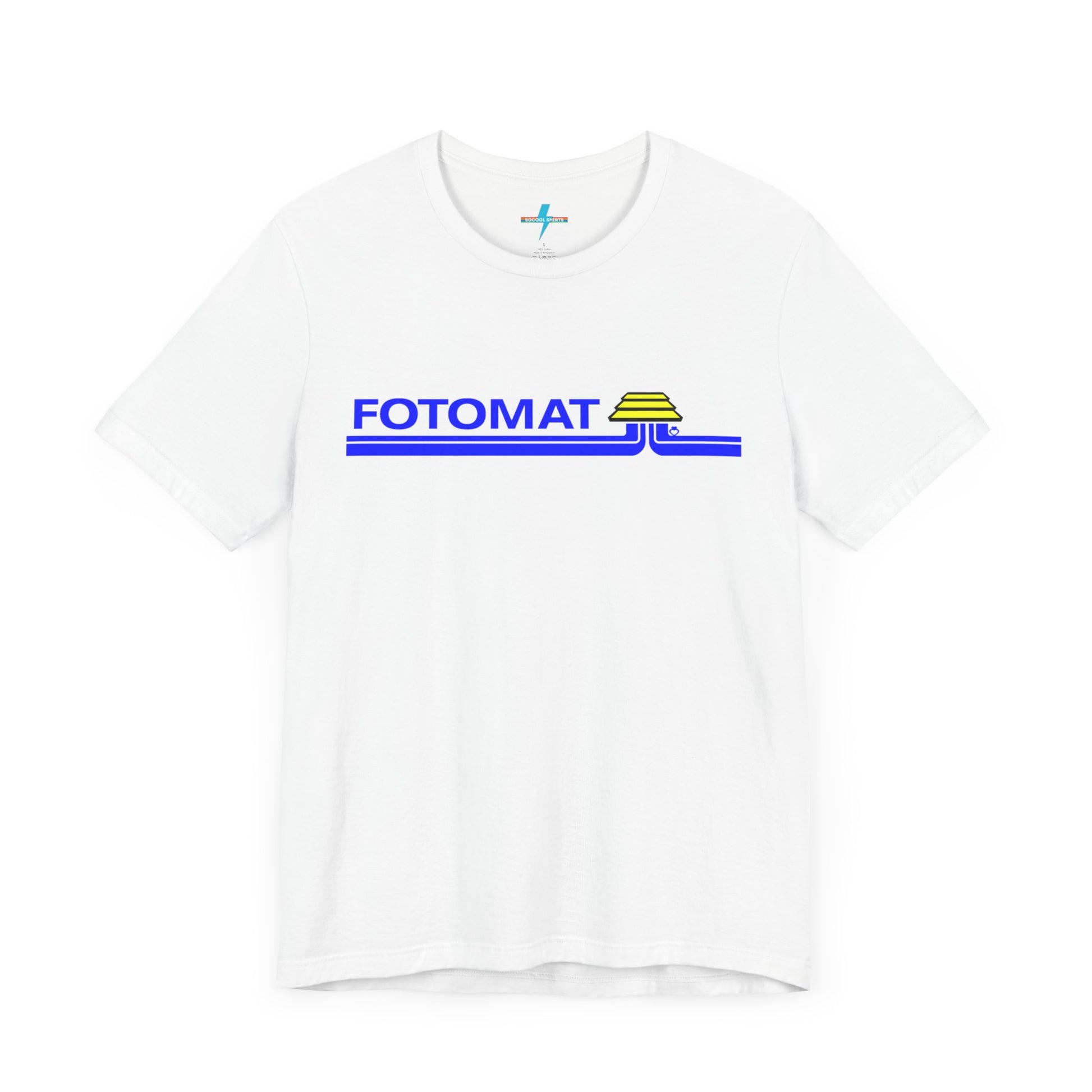 The Fotomat 1970s Retro T-Shirt by Printify is a dark gray short-sleeve shirt that features the word "FOTOMAT" in bold blue capital letters and a blue and yellow graphic design resembling layered lines and an upside-down triangle. This Tshirt captures the essence of 80s nostalgia with its centered, retro design.