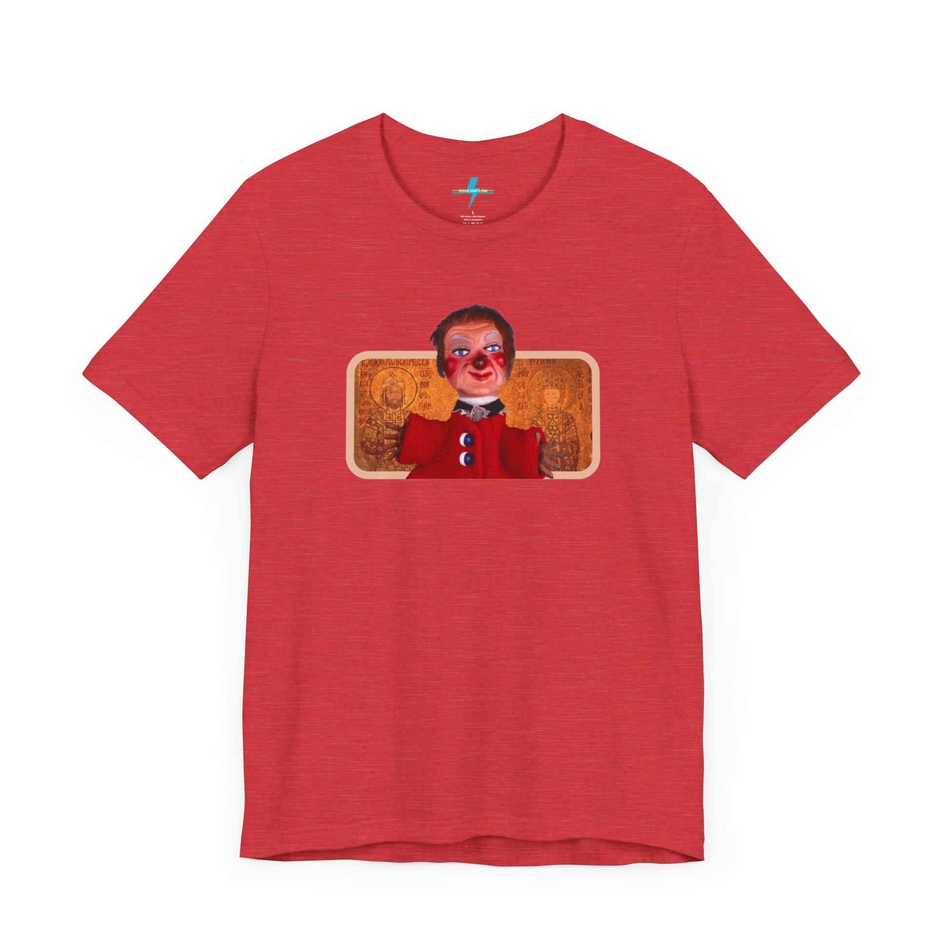 The rust-colored Printify Lady Elaine - Mr. Rogers Unisex Jersey Short Sleeve Tee features a detailed image of the Lady Elaine puppet, dressed in a red outfit with a painted face, set against an intricate artistic backdrop. The centrally positioned puppet and vivid colors create a striking contrast against the muted tone of the shirt, evoking nostalgic memories of Mr. Rogers' Neighborhood.