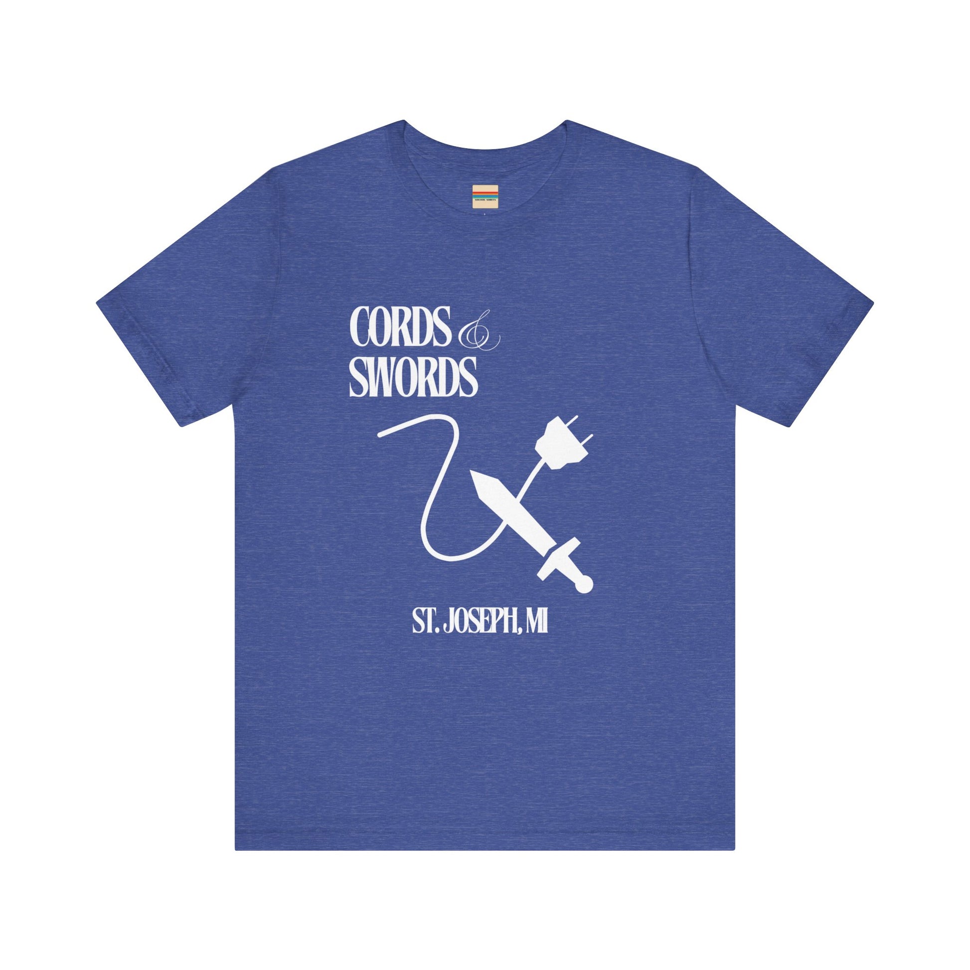 The SoCool Podcast - Cords & Swords Store T-Shirt by Printify is a vintage-inspired blue shirt that showcases a white graphic with the text "Cords & Swords" above illustrations of a crossed power cord and sword, along with "St. Joseph, MI" beneath. Ideal for tech enthusiasts, this design is centered on the front against a plain white background.