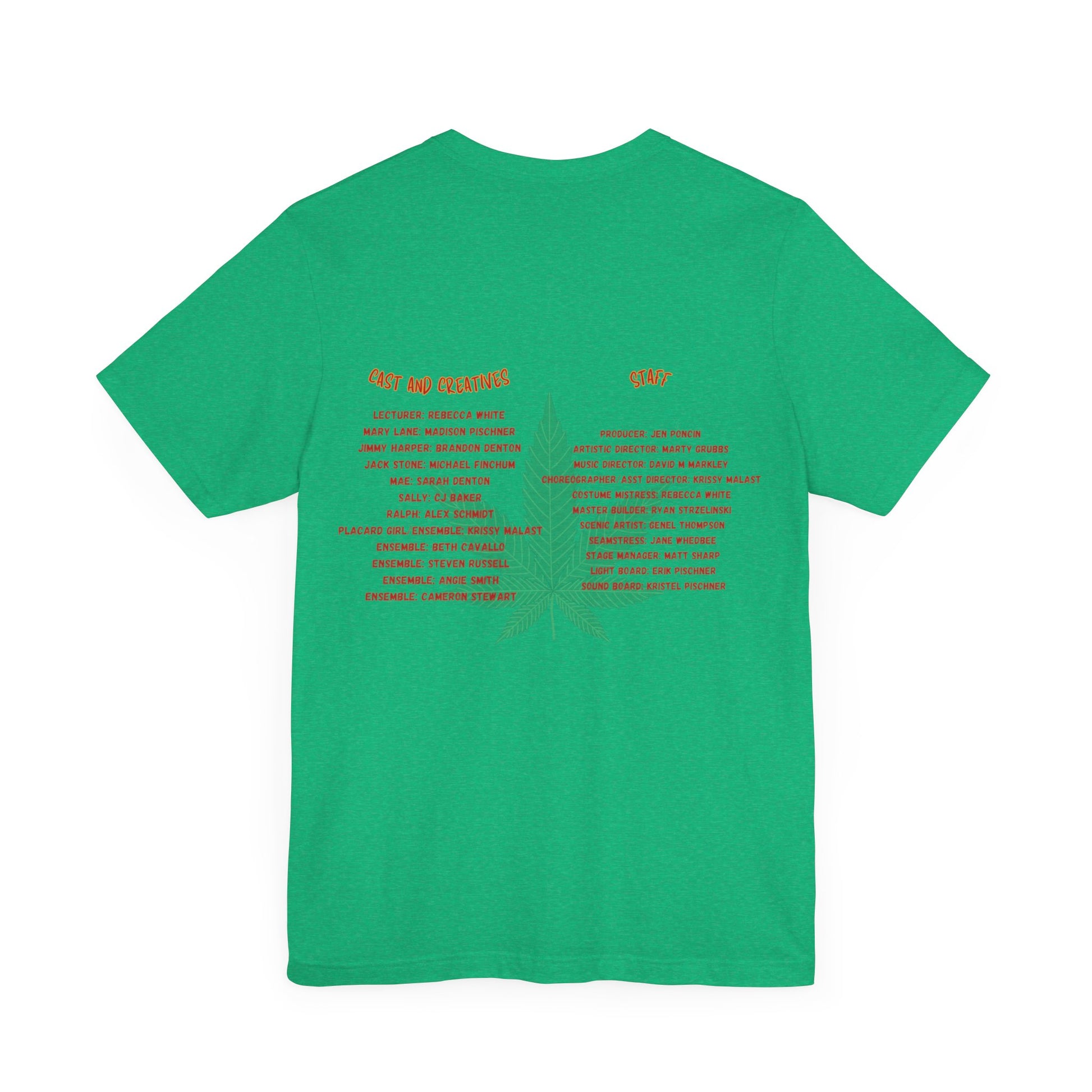 The Miller Community Theatre - Reefer Madness Cast and Crew Shirt by Printify showcases a vibrant design featuring bold, colorful text that reads "Reefer Madness The Musical" with a cartoon joint illustration. Below the main text, "A Miller Community Theatre Joint" is highlighted in red. This limited-edition green t-shirt, with its centered design, is perfect for cast and crew members.