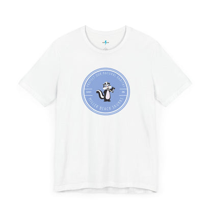 The Printify Miller Beach Skunks - Unisex Jersey Short Sleeve Tee is a gray T-shirt that features a circular blue logo at the center. Inside the logo, there is an illustration of a skunk with the text "Protect Our Habitat" and "Miller Beach Skunks" around the border, promoting environmental consciousness. The upper left part of the logo reads "Gary, IN.