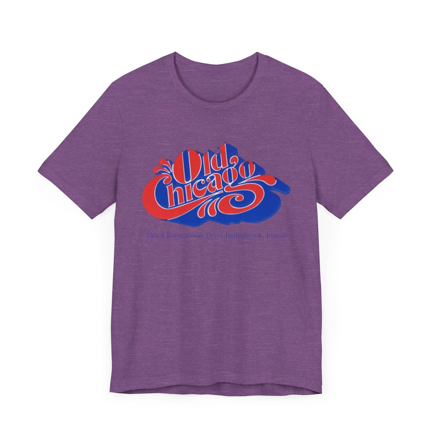 The "Old Chicago Mall Bolingbrook 1980s Retro - Unisex Jersey Short Sleeve Tee" from Printify is a gray T-shirt showcasing a vintage design with the text "Old Chicago" in blue and red. Beneath the main text, the address "355 S. Bolingbrook Drive, Bolingbrook, Illinois" appears in smaller font, evoking 80s nostalgia of the Old Chicago Mall. The shirt is displayed against a white background.