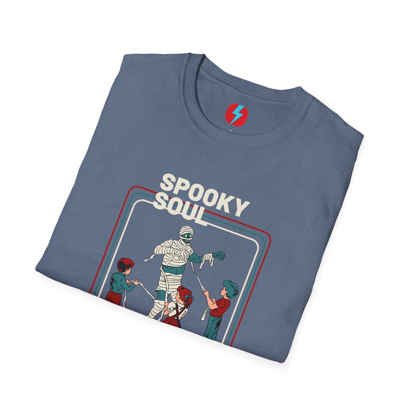 The Spooky Soul - Halloween - Unisex Softstyle T-Shirt by Printify, available in dark gray, showcases a retro-style graphic of a mummy dancing with two kids in Halloween costumes. The text "SPOOKY SOUL" is displayed above the image, which is framed by red and blue lines to enhance its vintage feel.