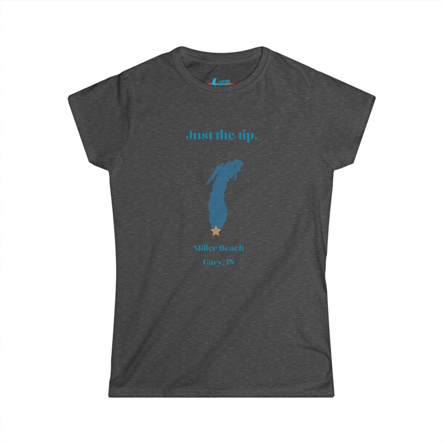 The Printify Just the Tip - Miller Beach Women's Softstyle Tee, crafted from high-quality tri-blend fabric, showcases a light blue color with a stylized wave graphic alongside the text "Just the tip. Miller Beach, Gary, IN." This tee is both casual and stylish, making it an ideal choice to express your beachside spirit.