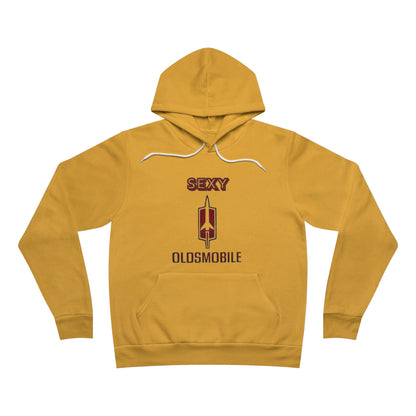 A "Sexy Oldsmobile - Unisex Sponge Fleece Pullover Hoodie" by Printify, displayed flat in gray, features bold red letters with a stylized graphic of the Oldsmobile logo below. Perfect for retro vibes, it includes a white drawstring and front pocket, designed for the muscle car enthusiast.