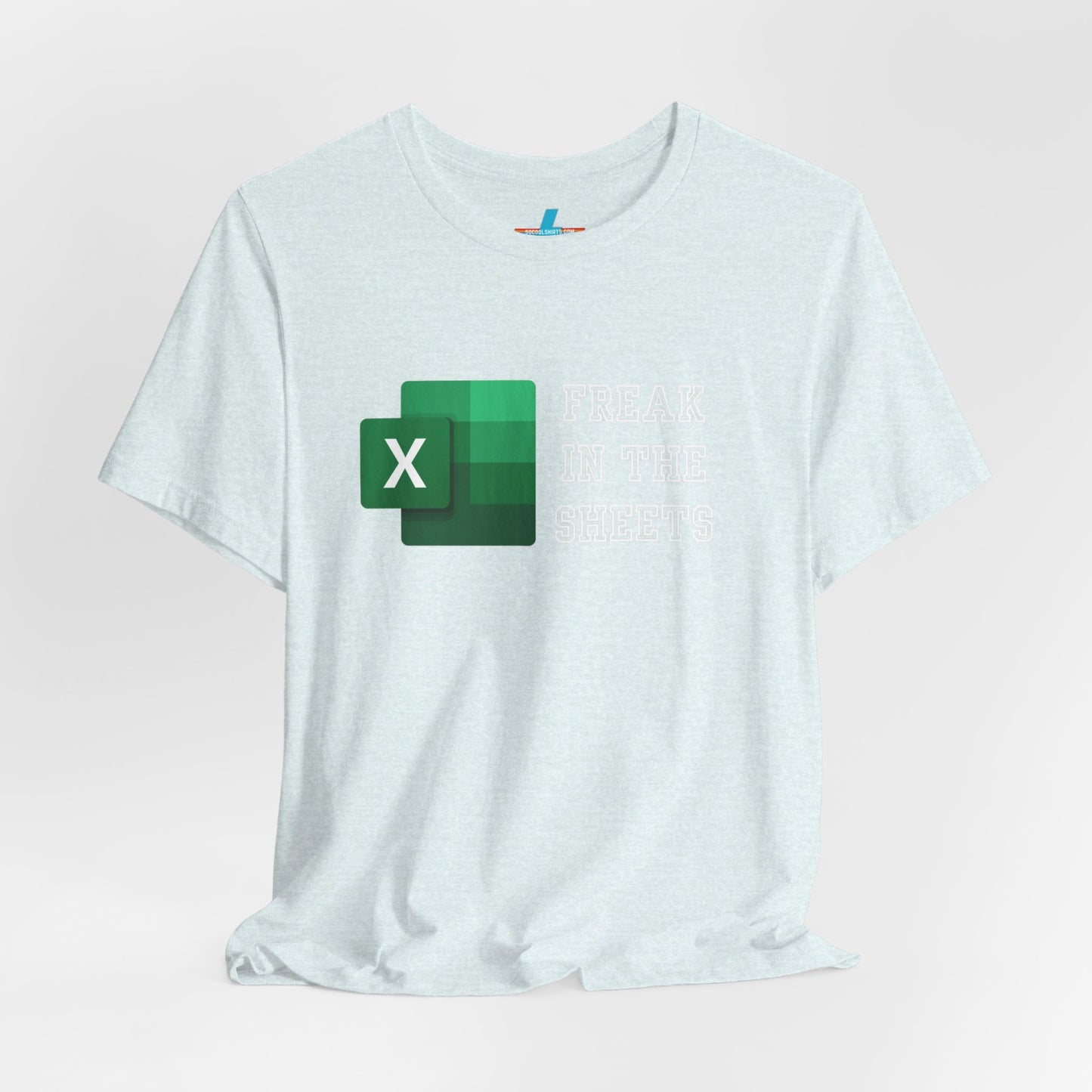 A green Freak in the Sheets - Excel - Unisex Jersey Short Sleeve Tee from Printify, featuring the Microsoft Excel logo on the left. The text next to the logo reads, "FREAK IN THE SHEETS" in white, bold, all-caps letters, making it perfect for spreadsheet enthusiasts. The shirt is laid flat against a plain white background.