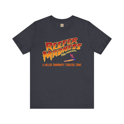 The Miller Community Theatre - Reefer Madness Cast and Crew Shirt by Printify showcases a vibrant design featuring bold, colorful text that reads "Reefer Madness The Musical" with a cartoon joint illustration. Below the main text, "A Miller Community Theatre Joint" is highlighted in red. This limited-edition green t-shirt, with its centered design, is perfect for cast and crew members.