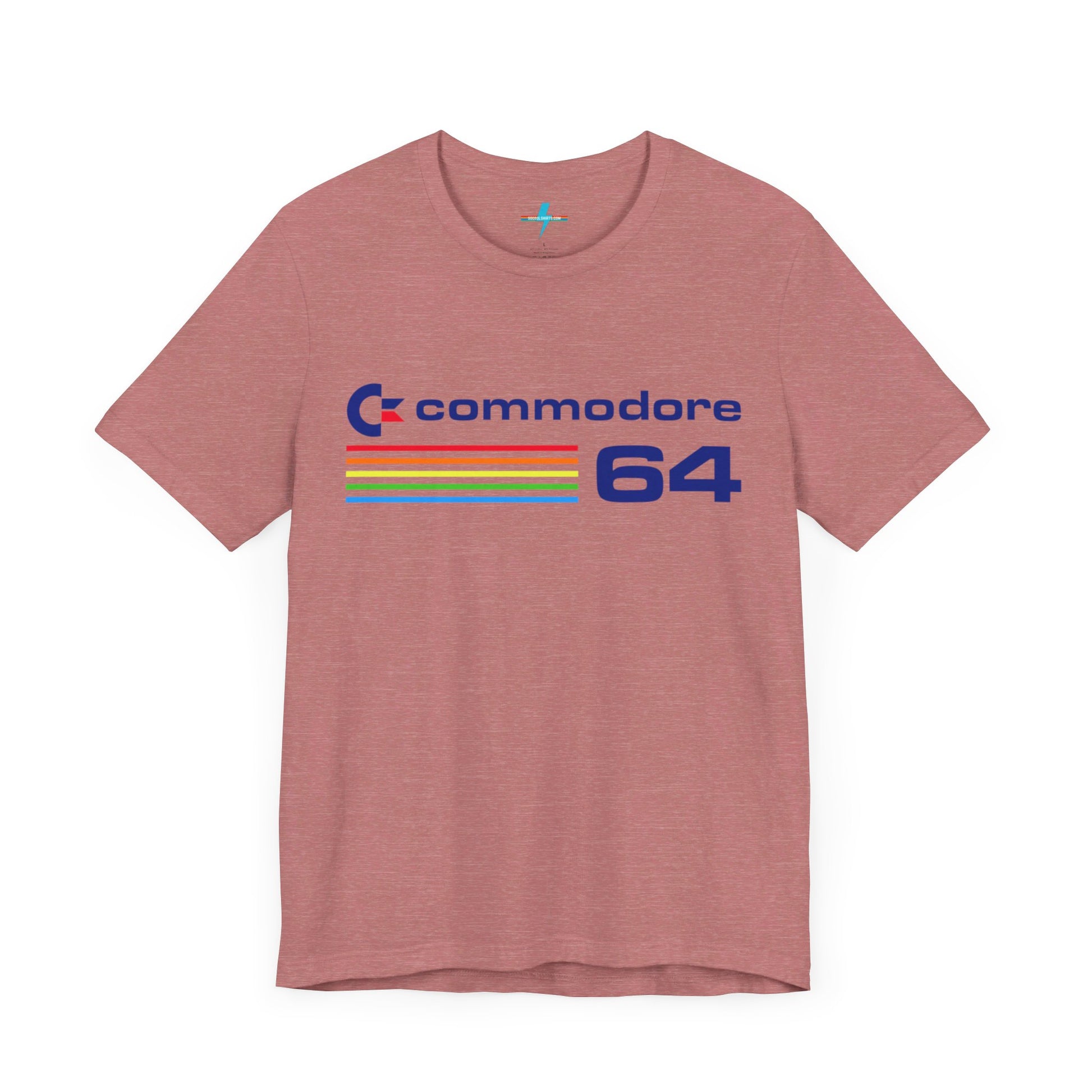 The 1980s Commodore 64 Computer C64 Unisex Jersey Short Sleeve Tee from Printify features a green T-shirt adorned with a vintage design showcasing the text "Commodore 64" and multicolored horizontal lines next to it. The word "Commodore" is emblazoned in blue alongside the Commodore logo, while the number "64" is also highlighted in blue on the right. Ideal for any retro tech enthusiast, this shirt is displayed against a white background.