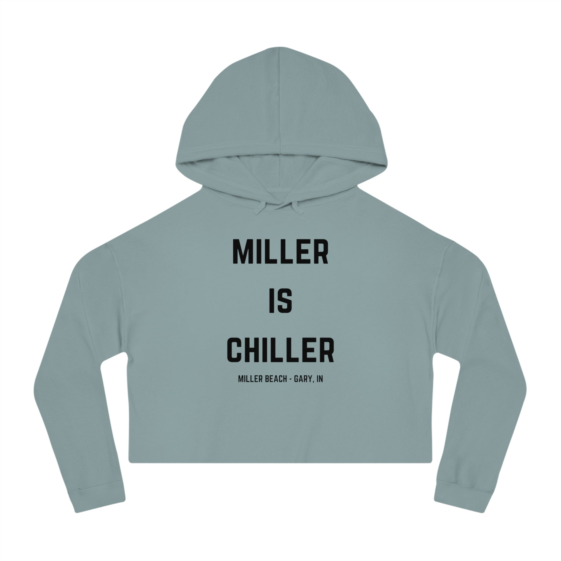 A white Women's Cropped Hooded Sweatshirt by Printify, featuring the phrase "MILLER IS CHILLER" printed in bold black letters on the front. Below the phrase, it says "MILLER BEACH • GARY, IN" in smaller black text. The SoCool Shirts hoodie includes a drawstring hood and long sleeves.