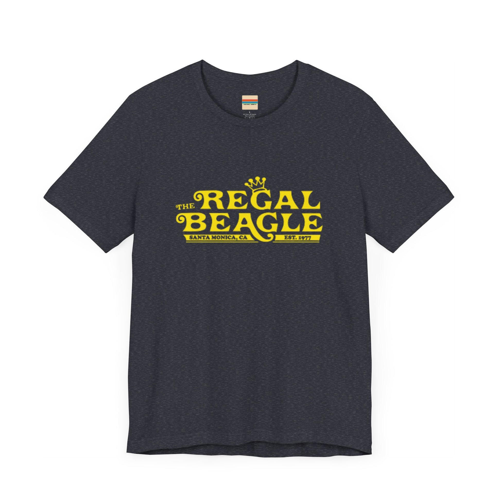 The Printify Regal Beagle - Three's Company Unisex Jersey Short Sleeve Tee, in black, showcases "The Regal Beagle, Santa Monica, CA, Est. 1977" text in a yellow vintage-style font. Crafted from 100% Airlume combed cotton for superior comfort.