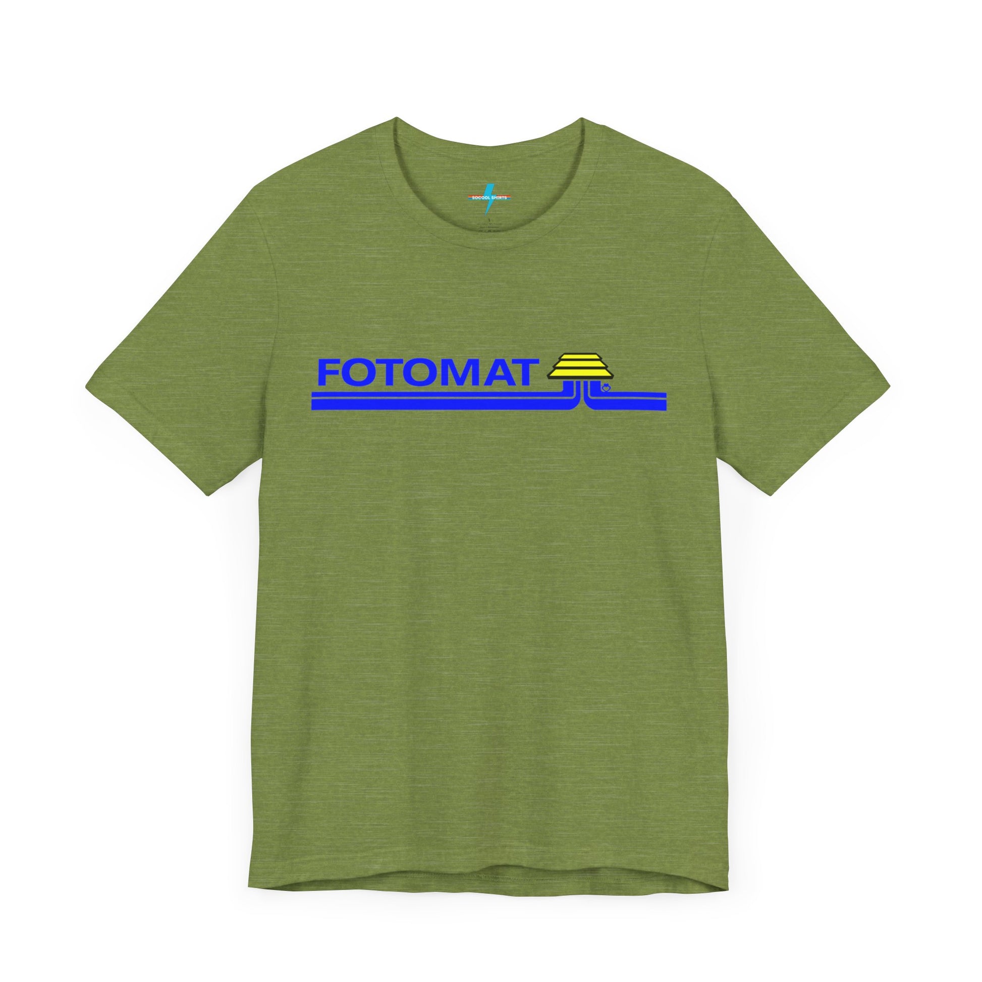 The Fotomat 1970s Retro T-Shirt by Printify is a dark gray short-sleeve shirt that features the word "FOTOMAT" in bold blue capital letters and a blue and yellow graphic design resembling layered lines and an upside-down triangle. This Tshirt captures the essence of 80s nostalgia with its centered, retro design.