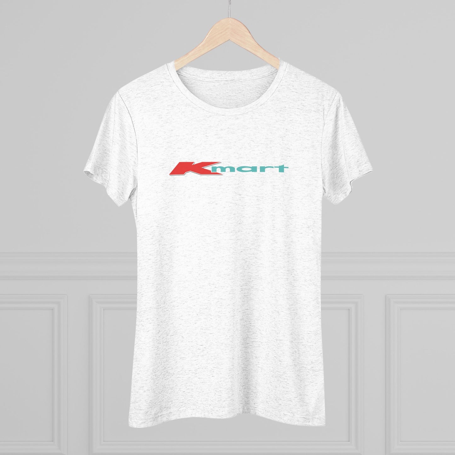 A women's triblend tee by Printify in light gray, featuring a casual and minimalist design that captures the essence of vintage style with a centered 1980s Retro Kmart logo on the front.