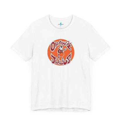 The Orange Julius 1980's Logo Unisex Jersey Style T-Shirt from Printify boasts a light gray color and features a vintage-style graphic. The design showcases the text "Orange Julius" in a stylized font within an orange circle, along with a small cartoon character holding a drink at the center—a nostalgic nod to timeless refreshment.