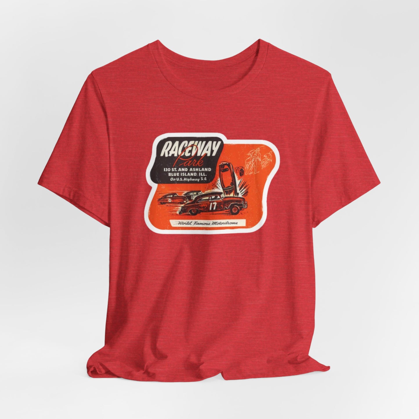 The 1970's Raceway Park - Blue Island, IL - Unisex Jersey Short Sleeve Tee by Printify is a light gray T-shirt featuring a graphic with a red background, an illustration of a race car labeled "17," and text reading "RACEWAY" and "As Seen On." The vintage-inspired design offers a nostalgic nod to classic car enthusiasts, reminiscent of the '70s racing era. The shirt is displayed against a plain background.