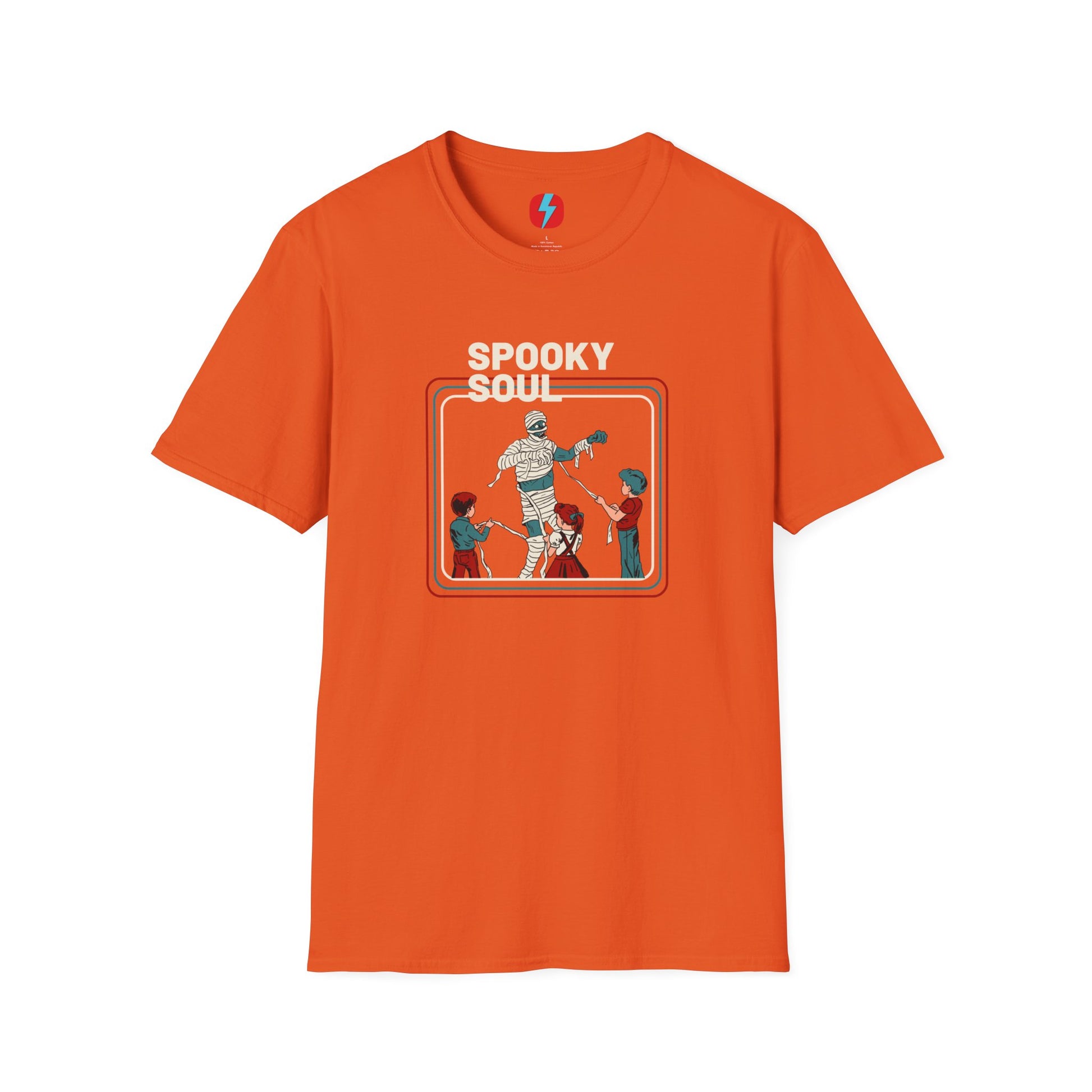 The Spooky Soul - Halloween - Unisex Softstyle T-Shirt by Printify, available in dark gray, showcases a retro-style graphic of a mummy dancing with two kids in Halloween costumes. The text "SPOOKY SOUL" is displayed above the image, which is framed by red and blue lines to enhance its vintage feel.