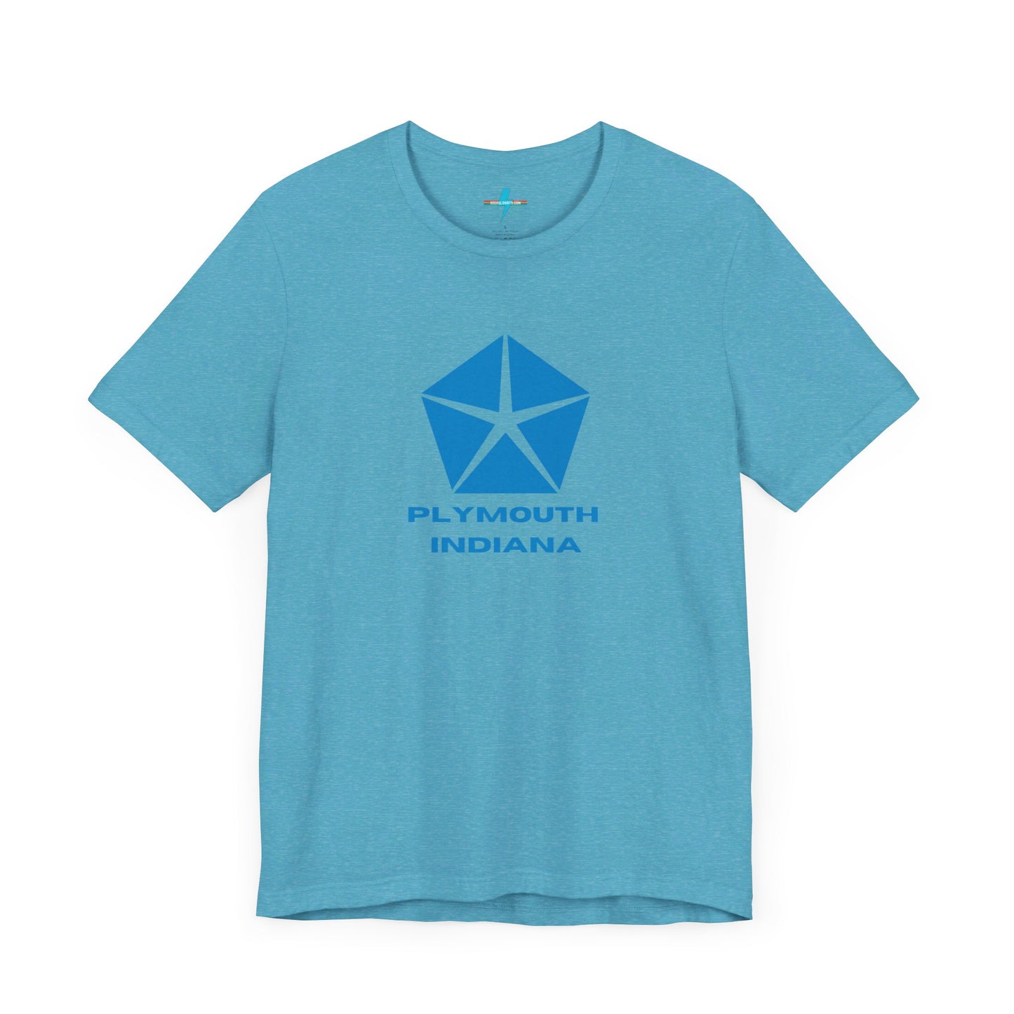 A black Printify Plymouth, Indiana Chrysler Logo T-shirt is displayed against a plain white background. The shirt features a blue, five-point star emblem reminiscent of a vintage autos design above the text "PLYMOUTH INDIANA" in blue, centered across the front. The shirt is laid out flat with the sleeves slightly bent.