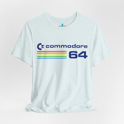 The 1980s Commodore 64 Computer C64 Unisex Jersey Short Sleeve Tee from Printify features a green T-shirt adorned with a vintage design showcasing the text "Commodore 64" and multicolored horizontal lines next to it. The word "Commodore" is emblazoned in blue alongside the Commodore logo, while the number "64" is also highlighted in blue on the right. Ideal for any retro tech enthusiast, this shirt is displayed against a white background.