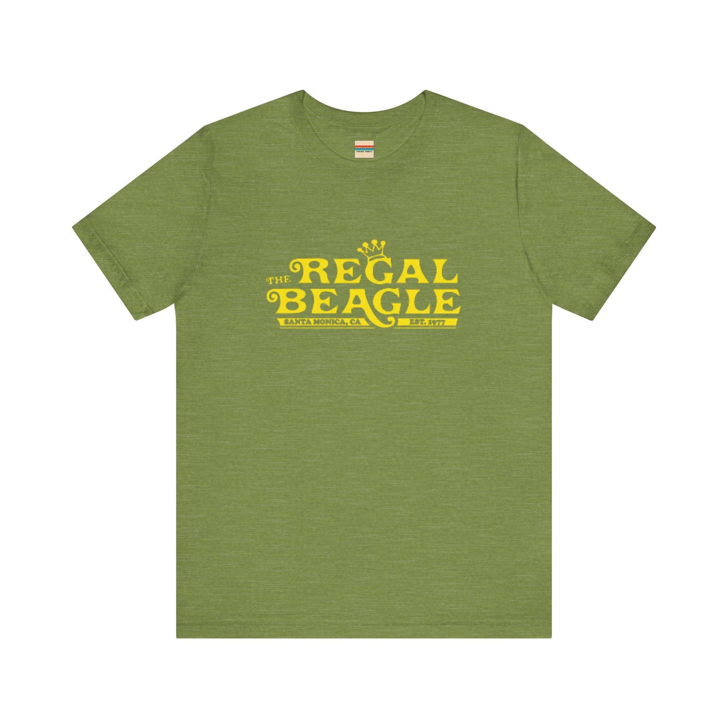 The Printify Regal Beagle - Three's Company Unisex Jersey Short Sleeve Tee, in black, showcases "The Regal Beagle, Santa Monica, CA, Est. 1977" text in a yellow vintage-style font. Crafted from 100% Airlume combed cotton for superior comfort.