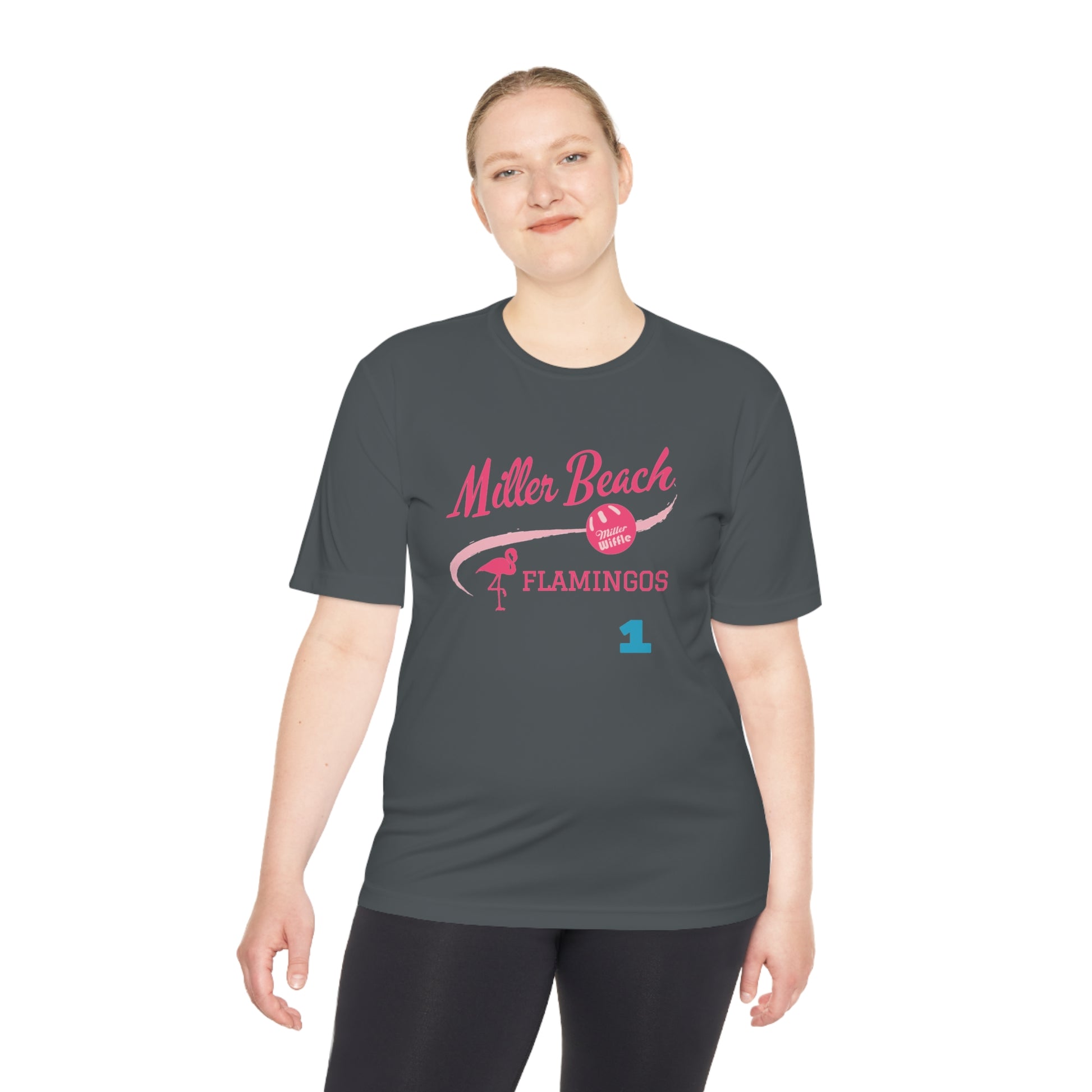 Introducing the "Miller Beach Flamingos - Jackson 01" Unisex Moisture Wicking Tee by Printify. This beige T-shirt showcases "Miller Beach" in a pink cursive font accompanied by a small pink flamingo illustration. Below, "FLAMINGOS" is displayed in bold pink capital letters, with a blue "01" on the bottom right corner. As part of the Sport-Tek PosiCharge Competitor collection, this lightweight shirt provides superior moisture-wicking performance.