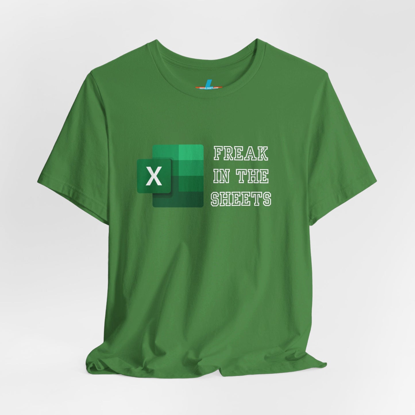 A green Freak in the Sheets - Excel - Unisex Jersey Short Sleeve Tee from Printify, featuring the Microsoft Excel logo on the left. The text next to the logo reads, "FREAK IN THE SHEETS" in white, bold, all-caps letters, making it perfect for spreadsheet enthusiasts. The shirt is laid flat against a plain white background.