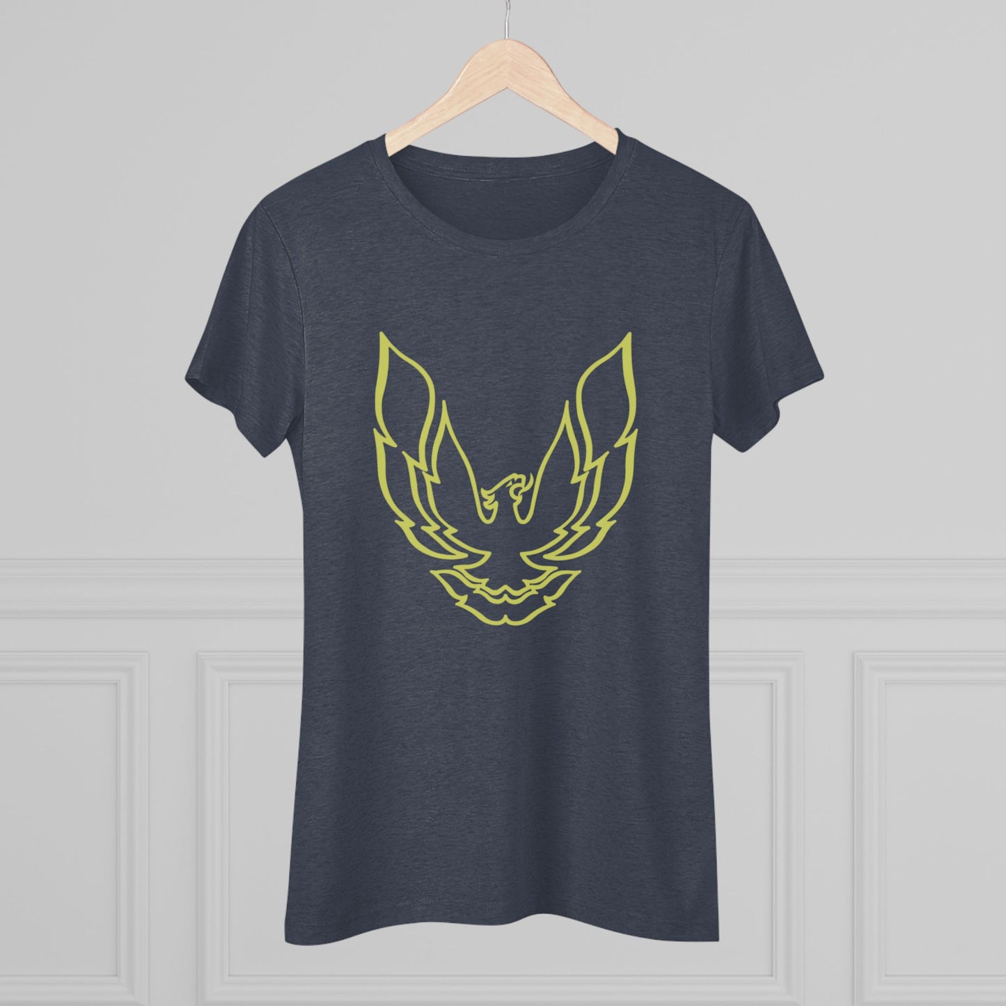 A retro 1970's-inspired red women's triblend tee by Printify, featuring a stylish gold phoenix design on the front. The vibrant, sleek graphic depicts the iconic Trans Am bird with its wings spread upward, giving this cozy t-shirt a bold and dynamic look.