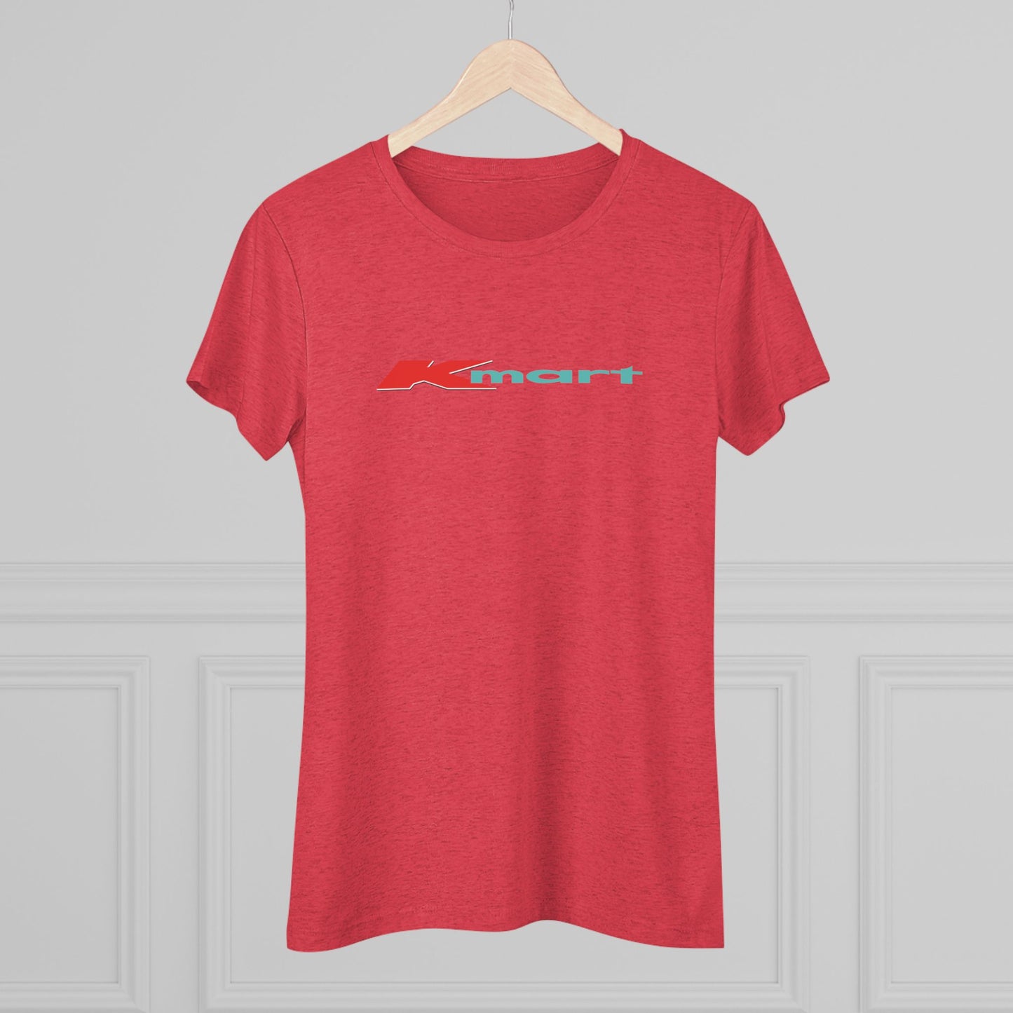 A women's triblend tee by Printify in light gray, featuring a casual and minimalist design that captures the essence of vintage style with a centered 1980s Retro Kmart logo on the front.