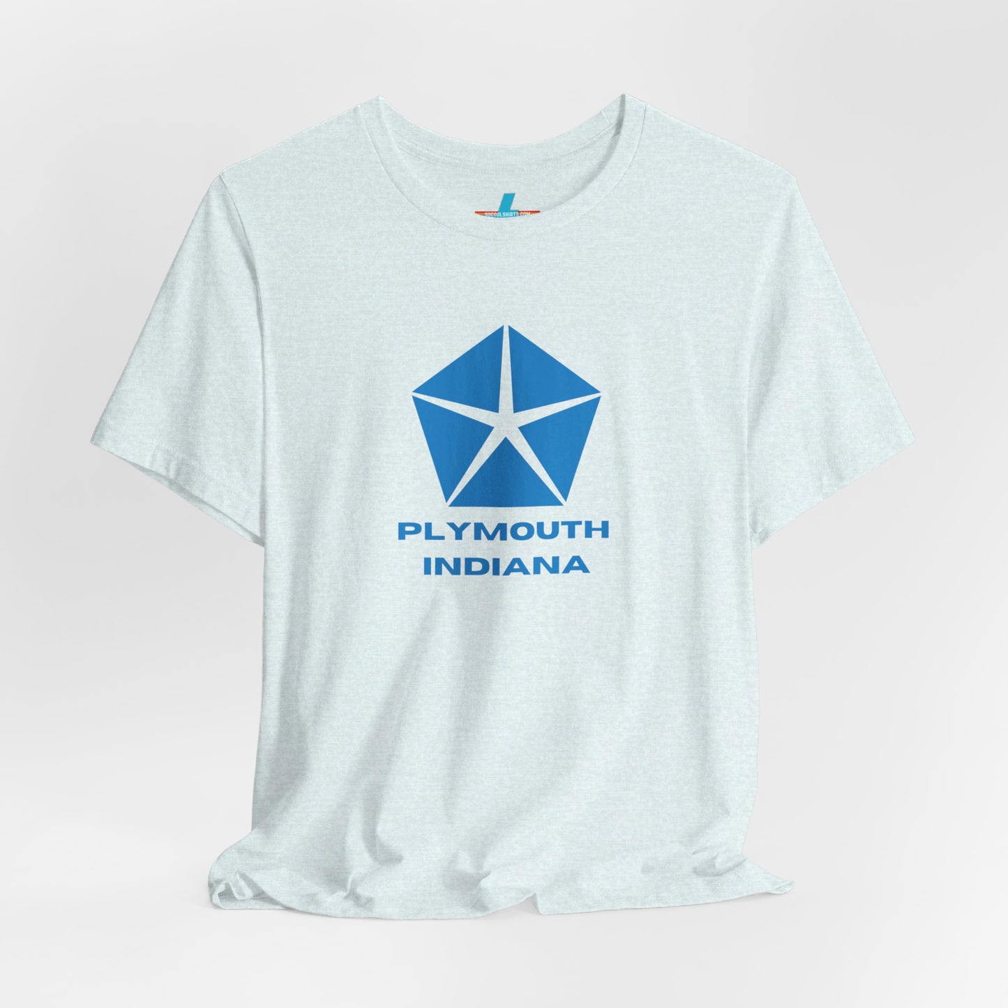 A black Printify Plymouth, Indiana Chrysler Logo T-shirt is displayed against a plain white background. The shirt features a blue, five-point star emblem reminiscent of a vintage autos design above the text "PLYMOUTH INDIANA" in blue, centered across the front. The shirt is laid out flat with the sleeves slightly bent.