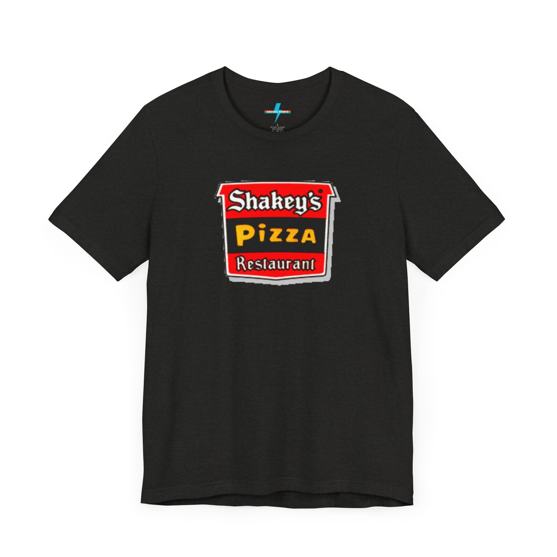 A black Shakey's Pizza - 1980s Retro Logo - Unisex T-Shirt by Printify hangs against a white background. The shirt features a colorful graphic with the text "Shakey's Pizza Restaurant" in white, yellow, and black lettering on a red background, resembling vintage pizza joints signage. This retro tee brings nostalgic vibes of classic pizzerias.